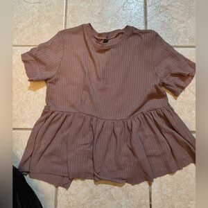 It’s a very pretty shirt made for going out but still a little casual.